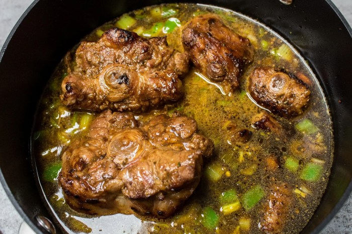 Oxtail jamaican delicious islands food caribbean oxtails jamaica dishes dinner dish traditional island meat tradition rice peas tail ox recipe